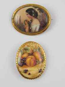 Appraisal: A hand painted oval porcelain brooch portrait of a woman