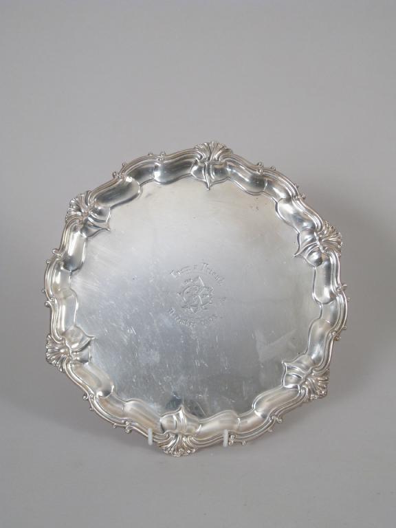 Appraisal: A Victorian shaped circular Salver with engraved inscription scallop and