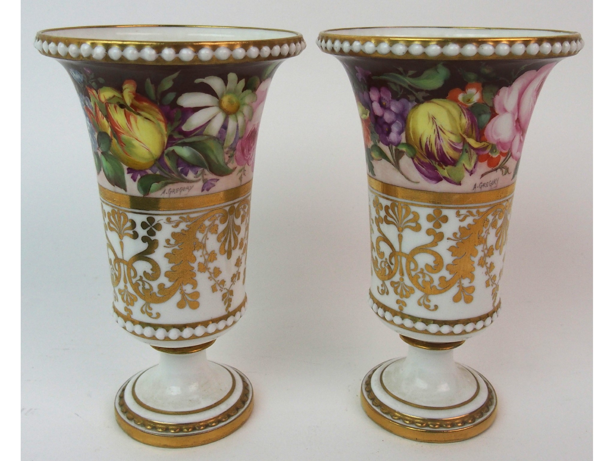 Appraisal: A pair of Royal Crown Derby painted porcelain bud vasestrumpet-form