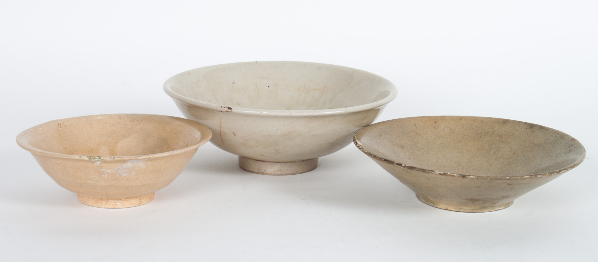 Appraisal: Three Chinese archaic porcelain bowls Condition All with firing flaws