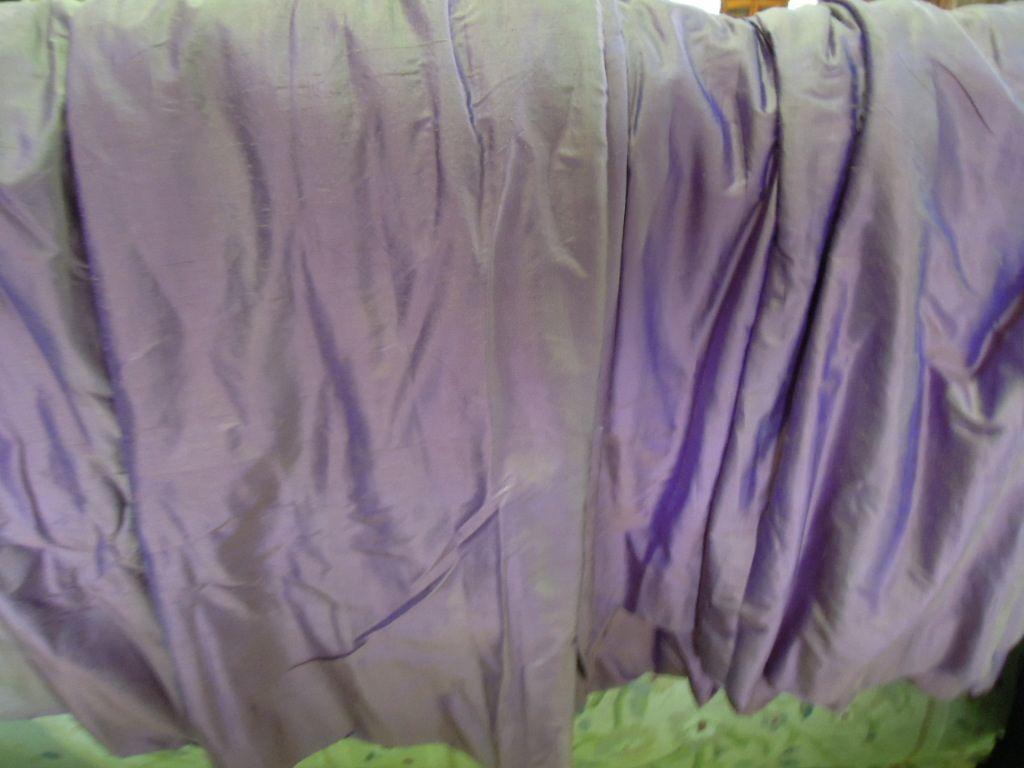 Appraisal: A pair of purple silk curtains