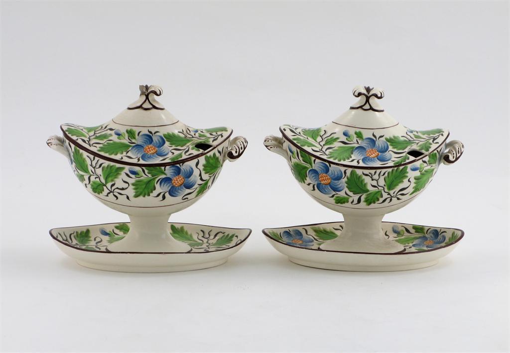 Appraisal: A pair of Davenport creamware sauce tureens and covers