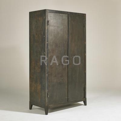 Appraisal: INDUSTRIAL Two-door cabinet USA th c Painted and patinated steel