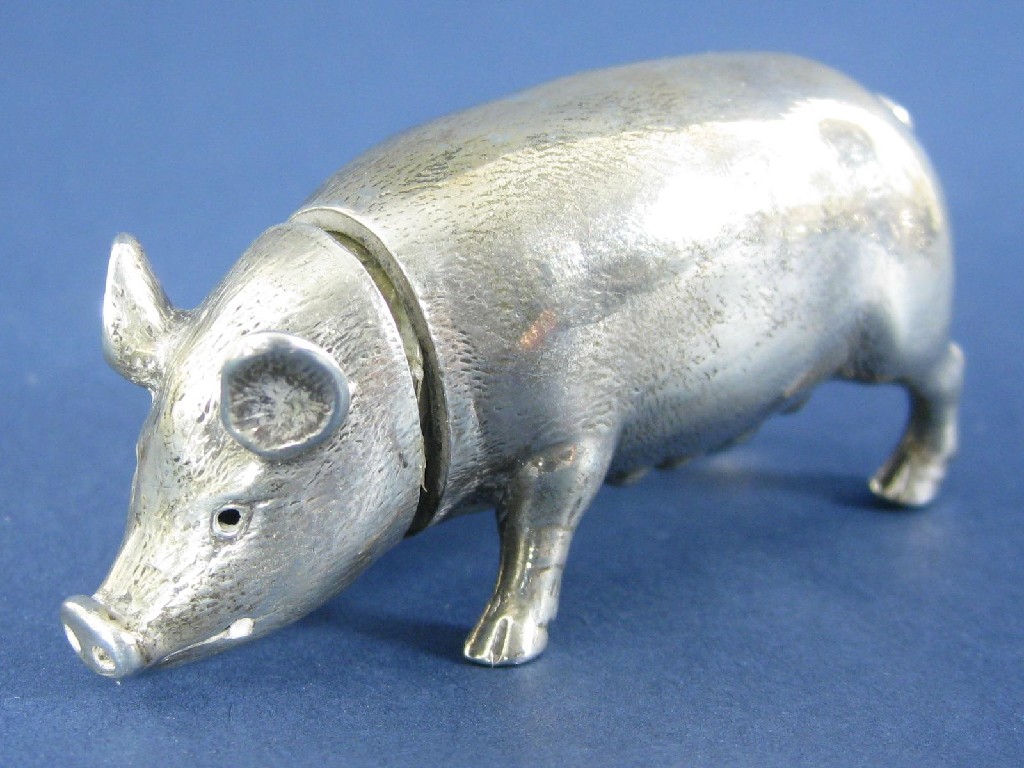 Appraisal: A Victorian Pepperette in the form of a seated pig