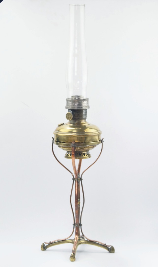 Appraisal: An Art Nouveau brass and copper paraffin lamp having brass