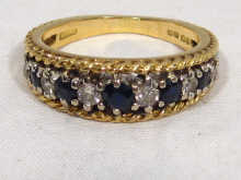 Appraisal: An carat gold diamond and sapphire ten stone ring