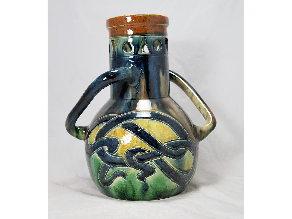 Appraisal: A large studio pottery puzzle vase with two off set