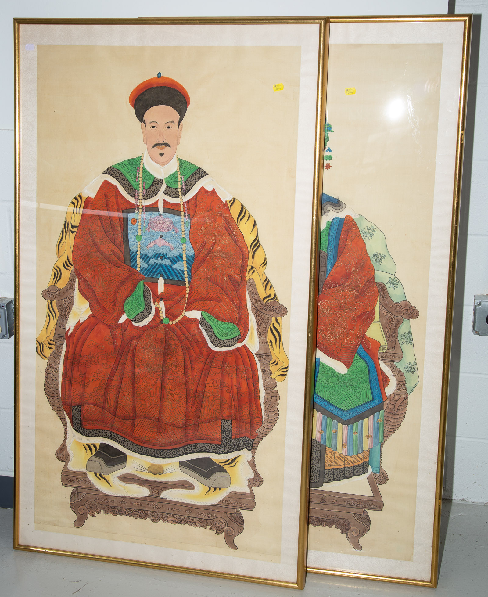 Appraisal: A PAIR OF LARGE FRAMED CHINESE ANCESTRAL PORTRAITS th century