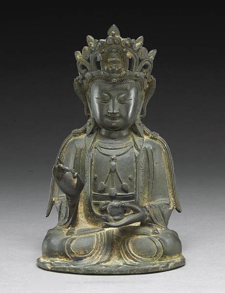 Appraisal: A cast bronze seated figure of Guanyin th Century Shown