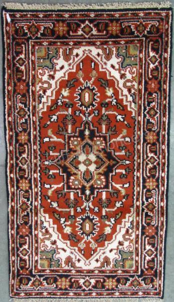 Appraisal: Handmade Oriental Area Rug Heriz design brown field with cream