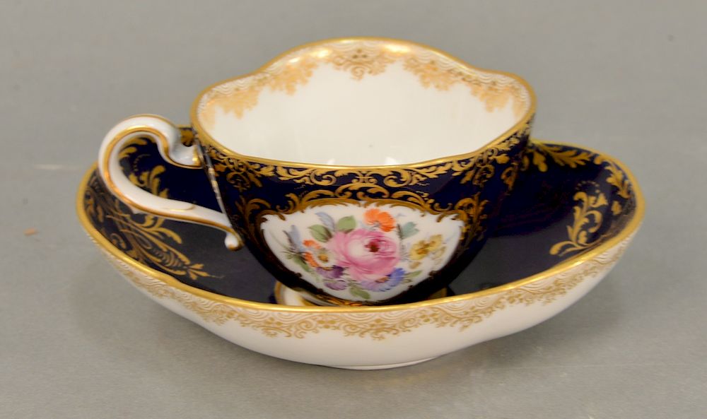 Appraisal: Meissen porcelain cup and saucer cobalt blue ground with painted