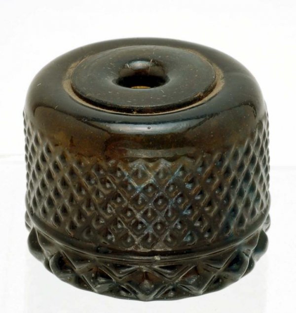 Appraisal: A dark amber or light green diamond pattern three-mold cylindrical-form