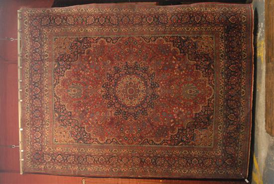 Appraisal: CARPET A semi-antique roomsize Persian Lavar Kirmen carpet Executed in