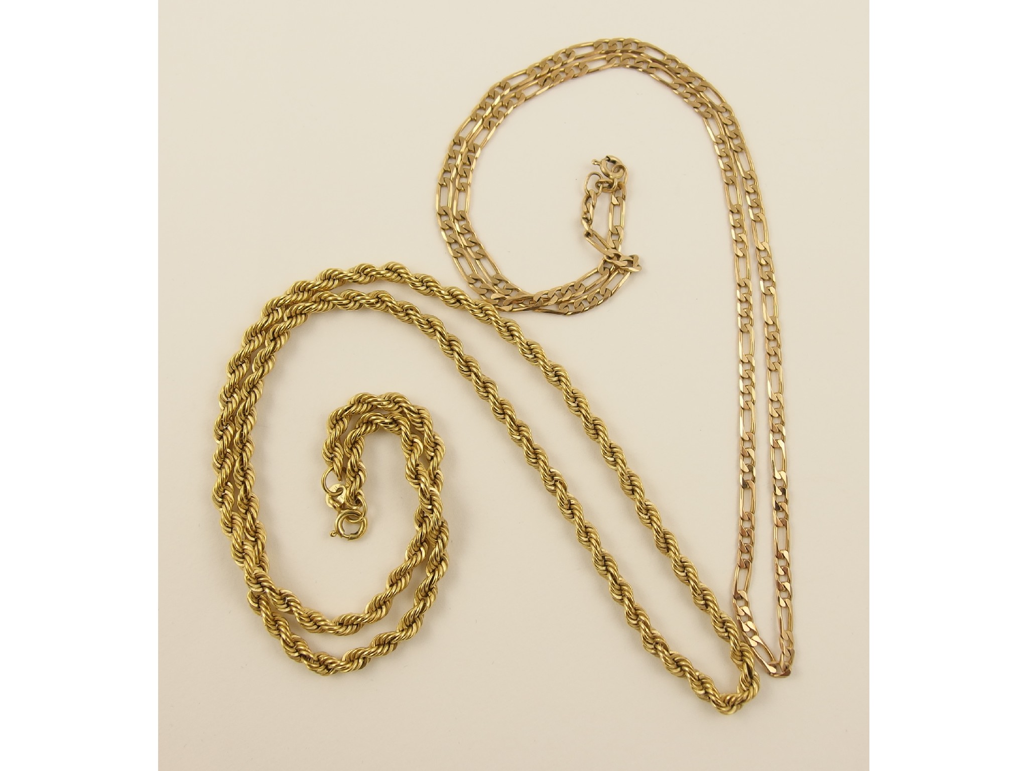 Appraisal: A ct rope chain together with a ct Figaro chain