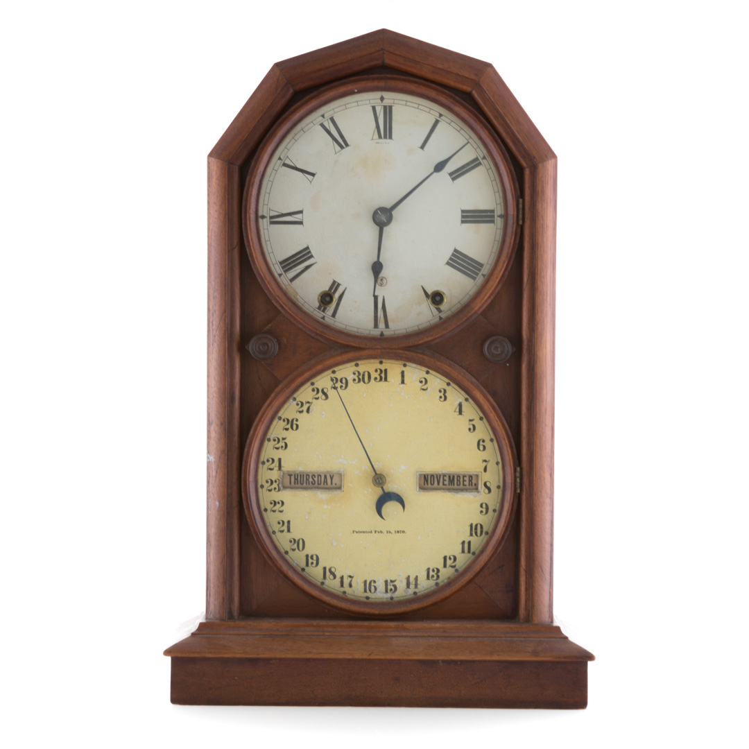 Appraisal: Seth Thomas double dial calendar clock mantel clock patented walnut