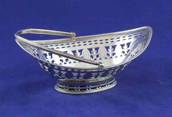 Appraisal: A George III pierced silver boat shaped sweetmeat basket with