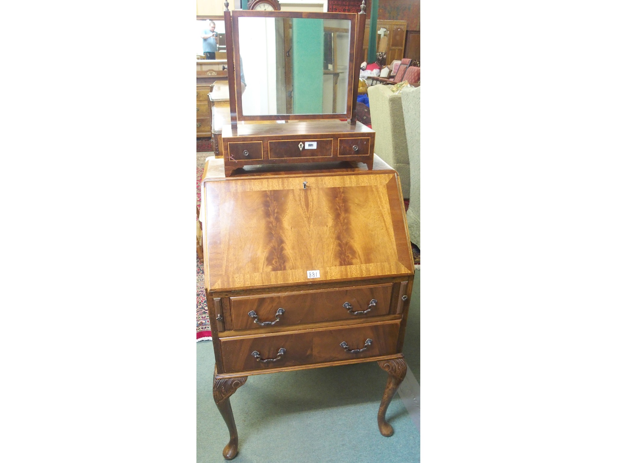 Appraisal: A mahogany bureau and three drawer mahogany toilet mirror