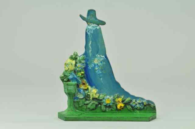 Appraisal: BRIDESMAID DOORSTOP BOOK EXAMPLE numbered '' '' cast iron silhouette