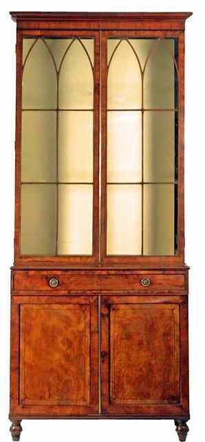 Appraisal: A George IV mahogany bookcase the moulded cornice over a