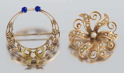 Appraisal: Two Victorian Brooches Containing a yellow gold wreath brooch with