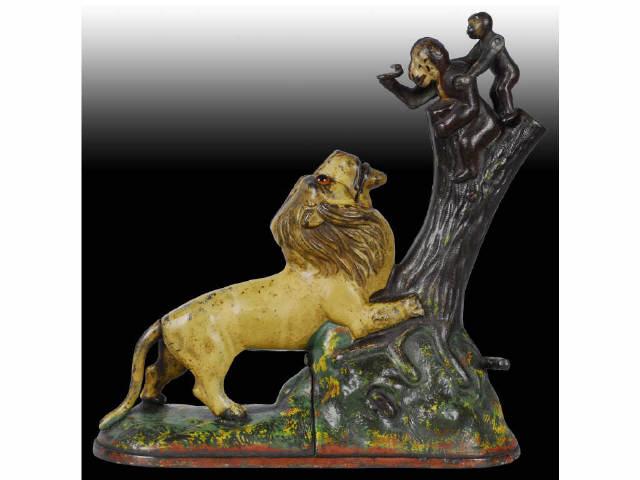 Appraisal: Cast Iron Lion Monkeys Mechanical Bank Description Manufactured by Kyser