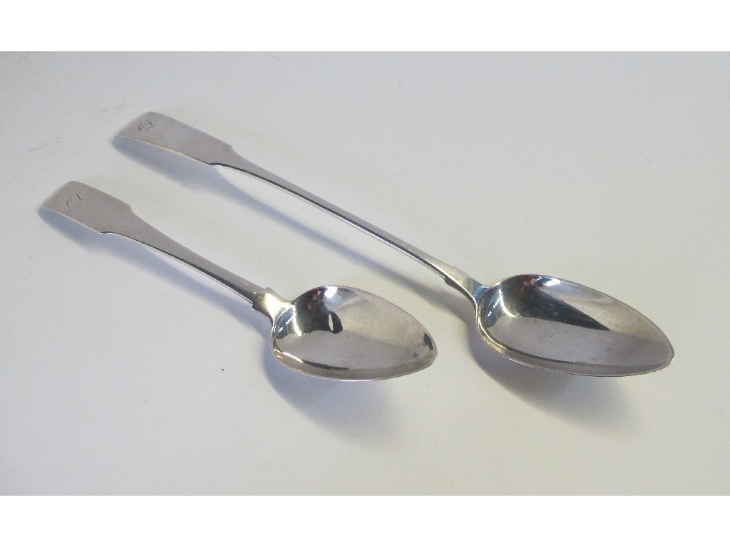 Appraisal: Lot comprising silver serving spoon and silver table spoon Edinburgh