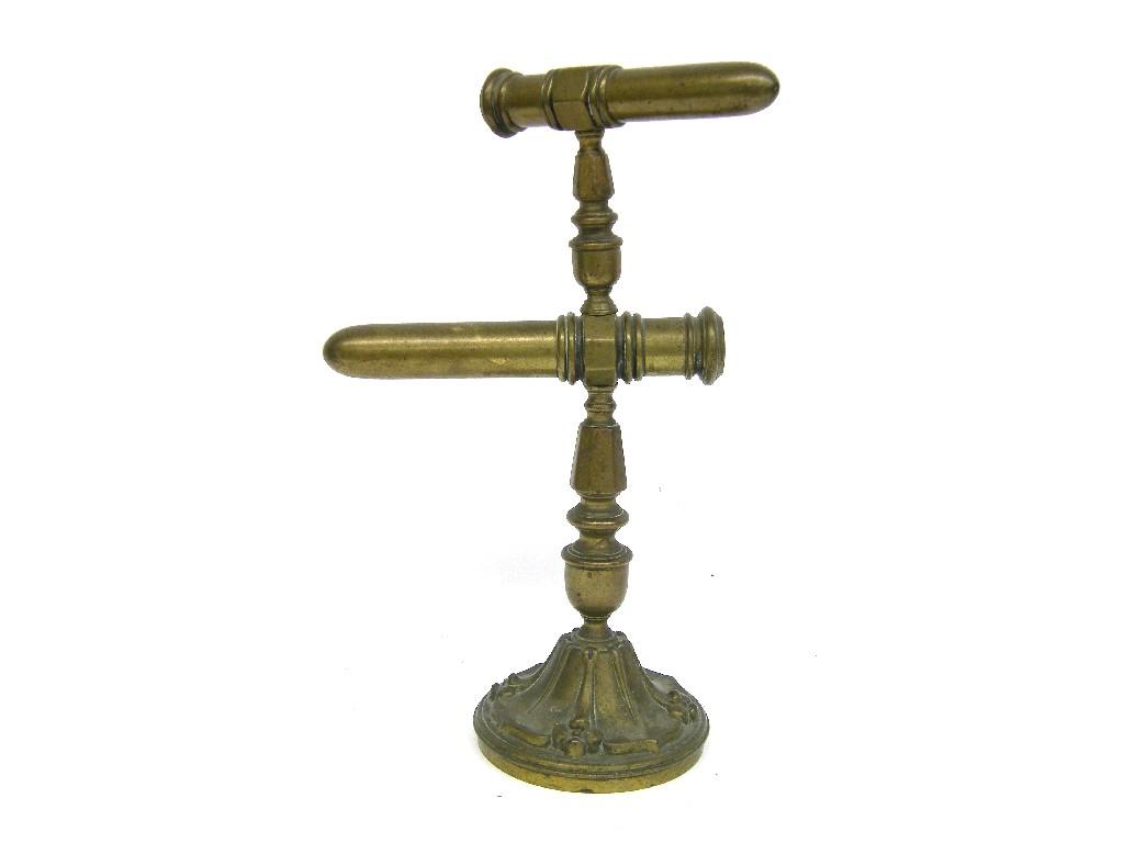 Appraisal: Victorian brass goffering irons upon a turned stem and circular