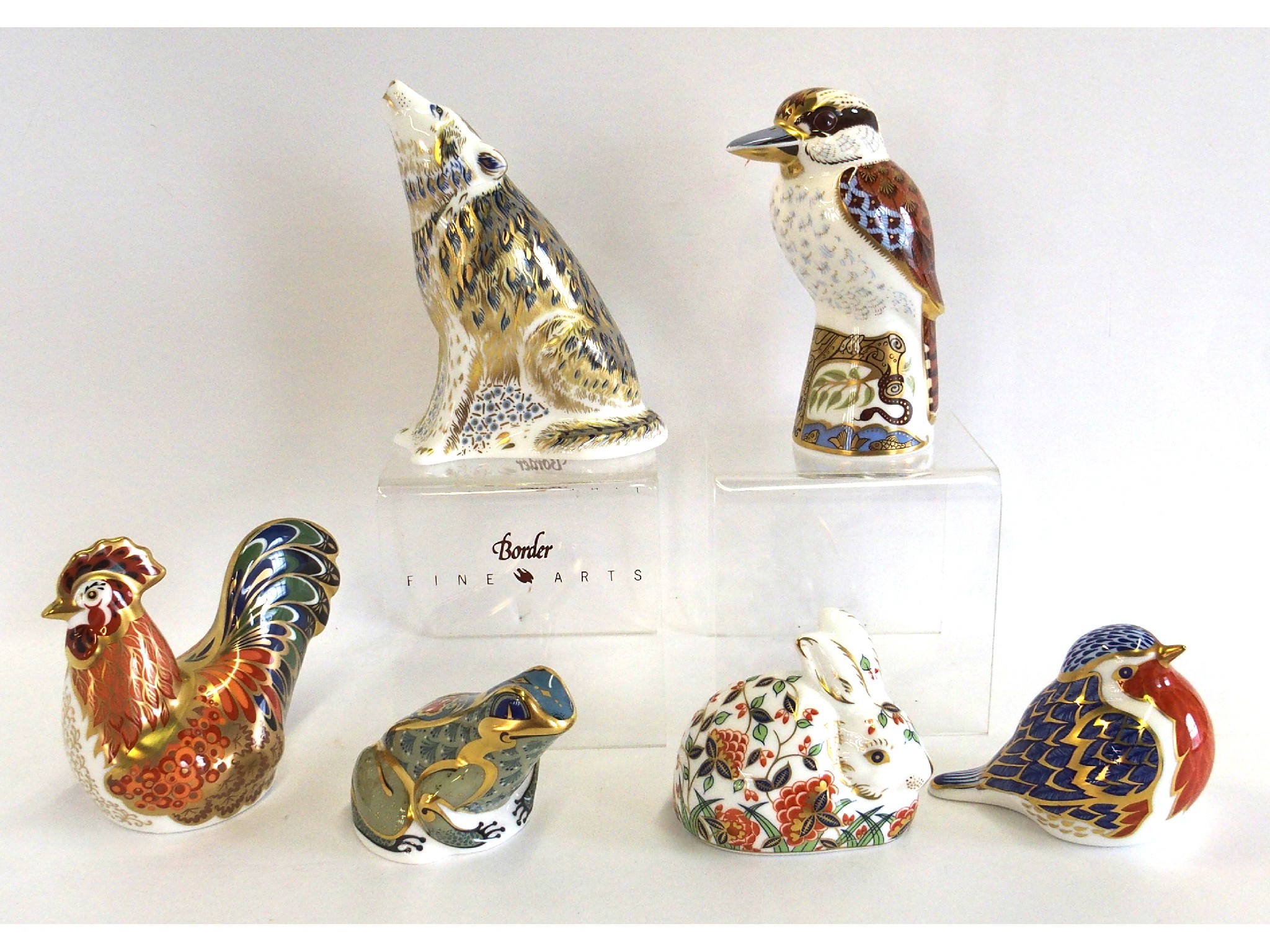 Appraisal: Six Royal Crown Derby paperweights including Wolf Kookaburra Bantam Cockerel