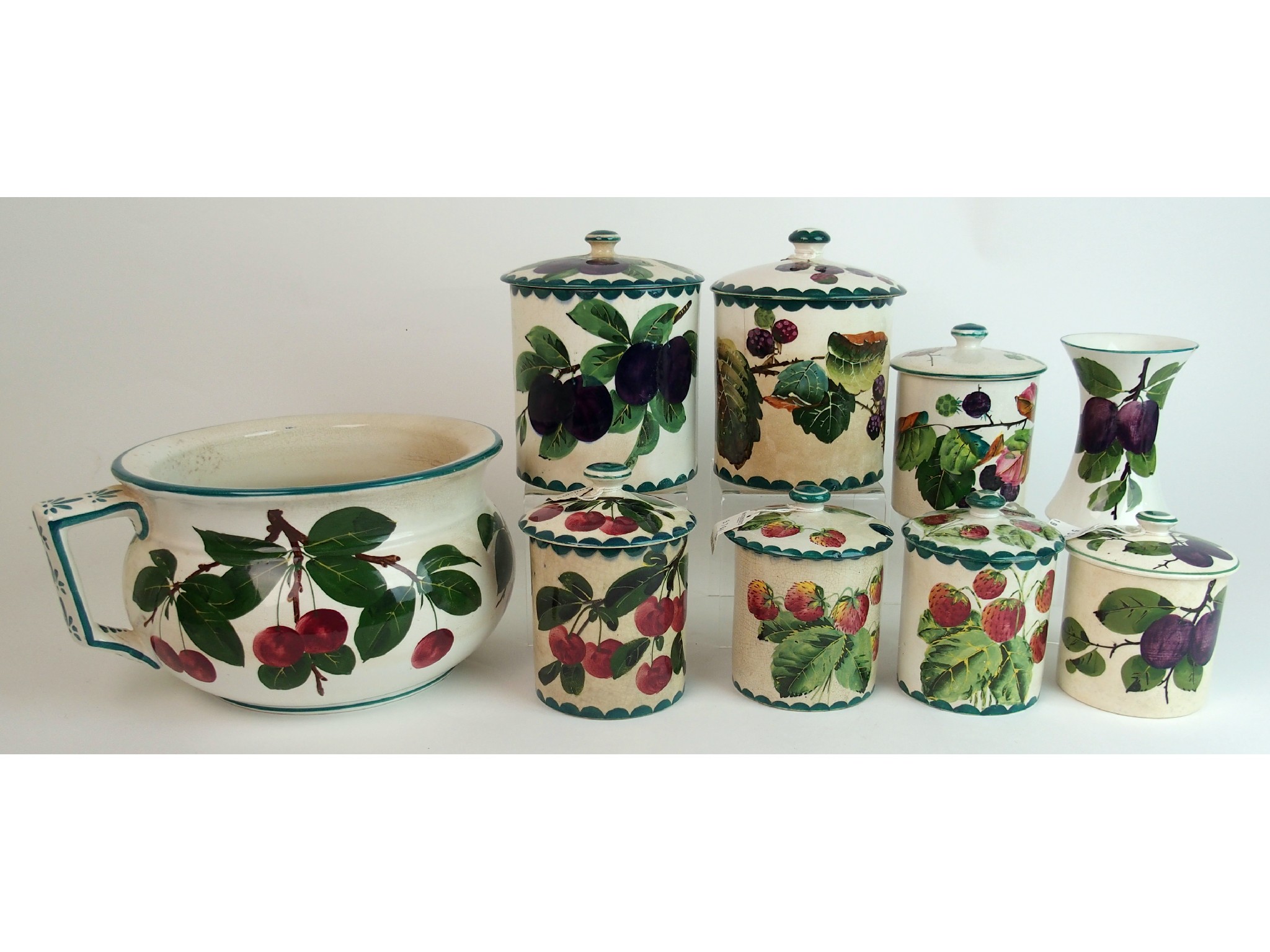 Appraisal: A group of Wemyss Ware potterya chamber pot painted with