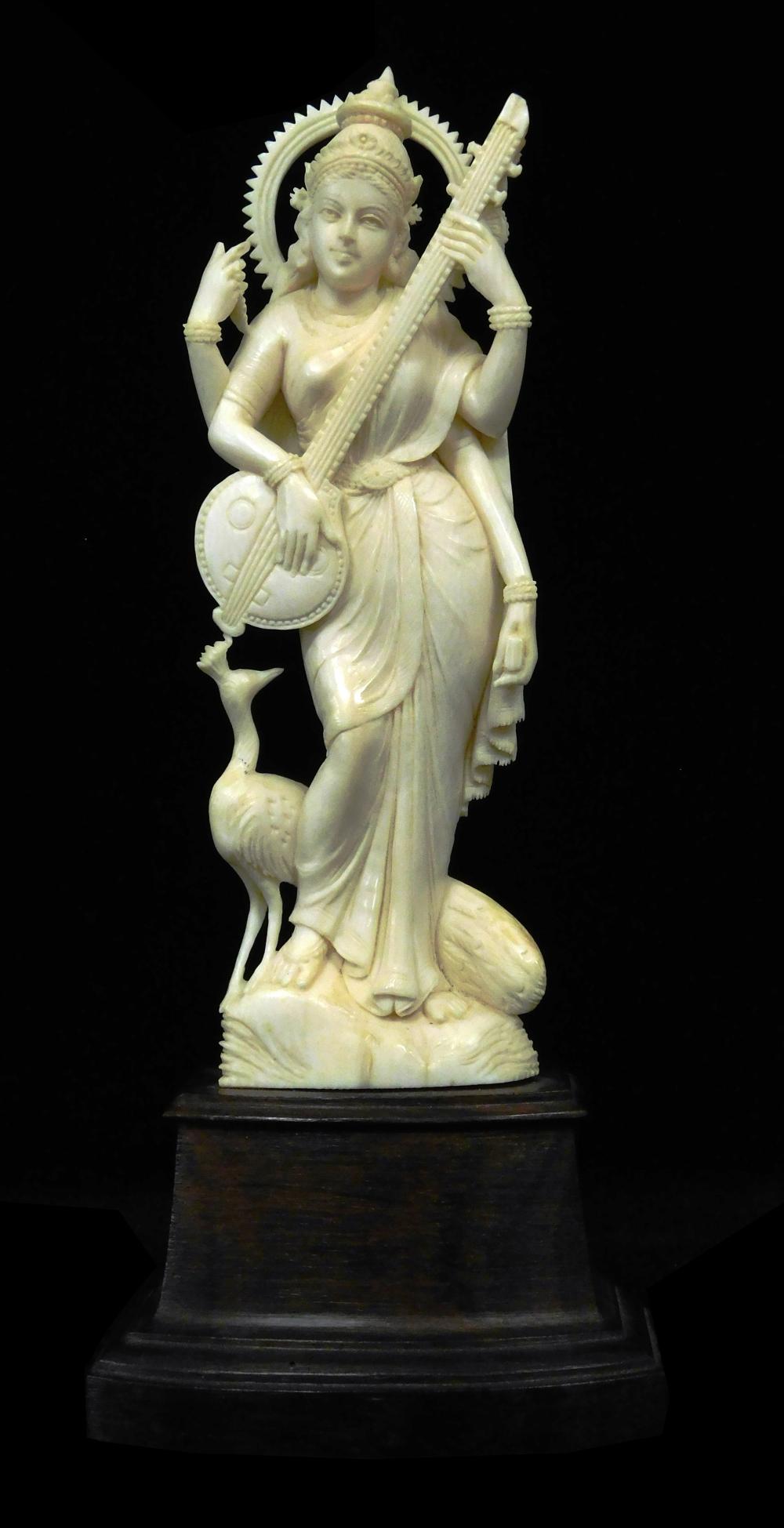 Appraisal: ASIAN Ivory carving of Saraswati Indian th th C depicting