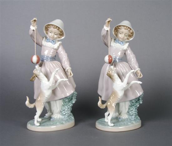 Appraisal: A Pair of Lladro Figural Groups Height inches