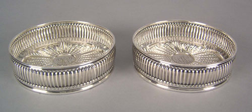 Appraisal: Pair of Tiffany Co sterling silver wine coasters dated h