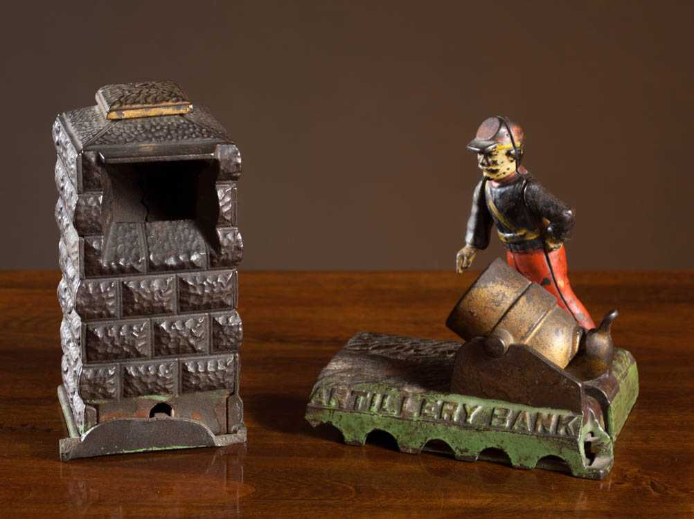 Appraisal: J E STEVENS CAST IRON ARTILLERY MECHANICAL BANK comprised of