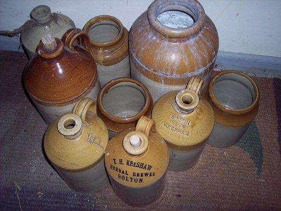 Appraisal: A stoneware bottle marked T Kelshaw Herbal Brewer Bolton cm