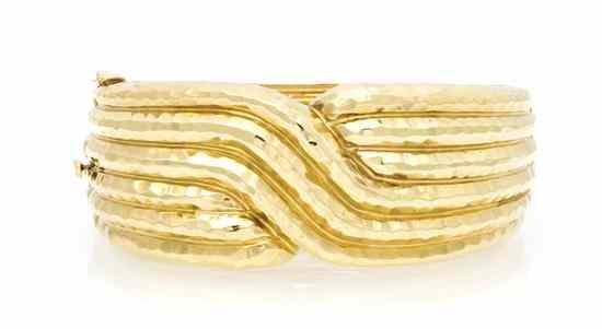 Appraisal: A Karat Yellow Gold Hammered Textured Bangle Bracelet in a