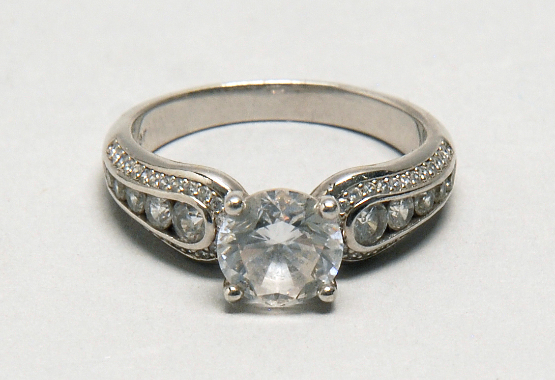 Appraisal: STAUER ZIRCON SOLITAIRE ENGAGEMENT RING In a vintage-style sterling silver