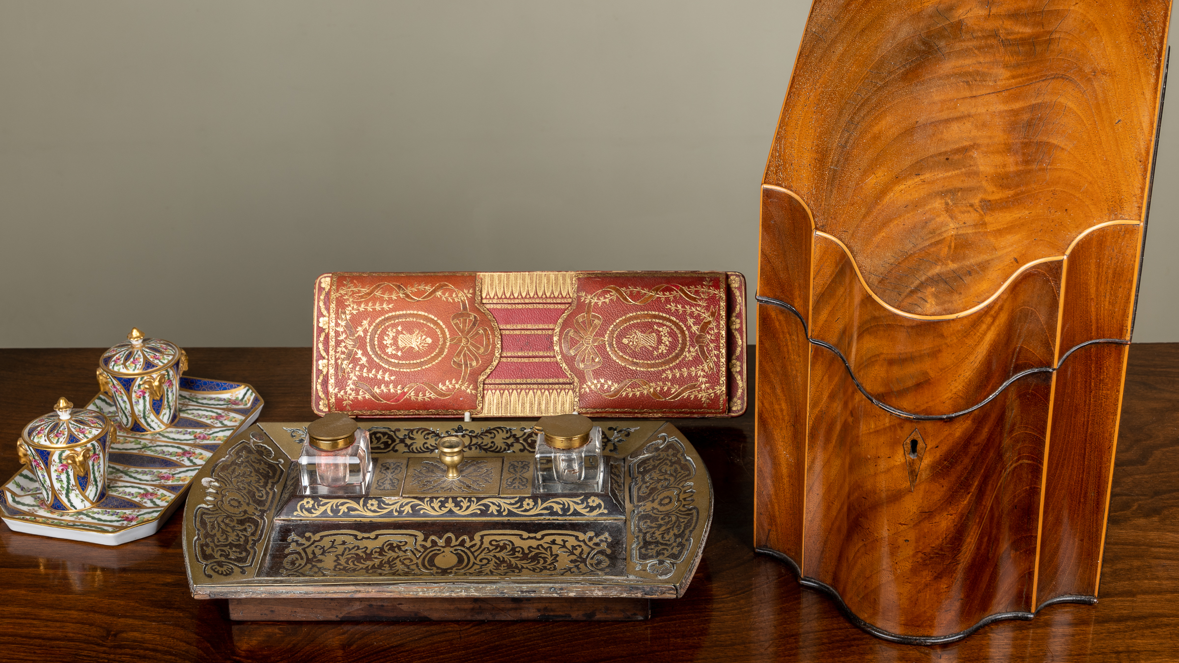 Appraisal: An early th century mahogany serpentine fronted knife box converted