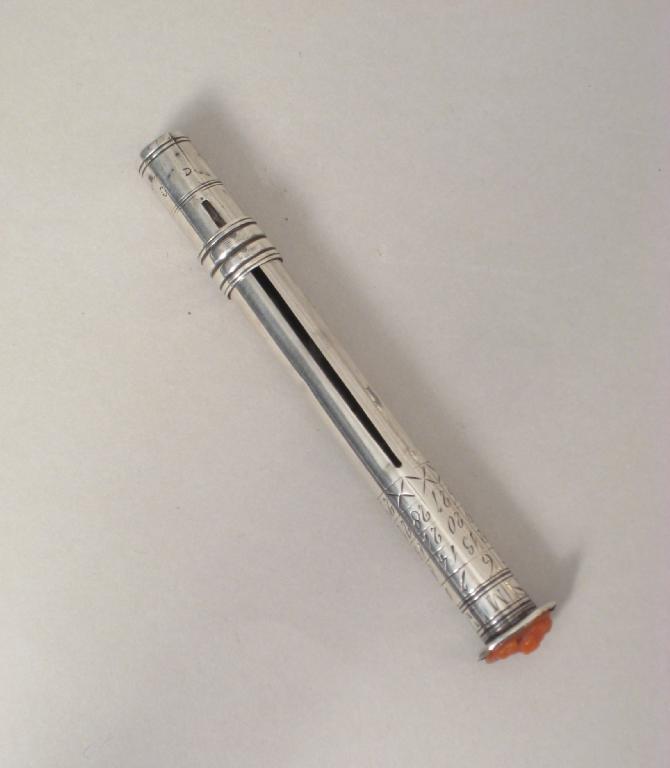 Appraisal: A George III cylindrical Wax Holder engraved with calendar the