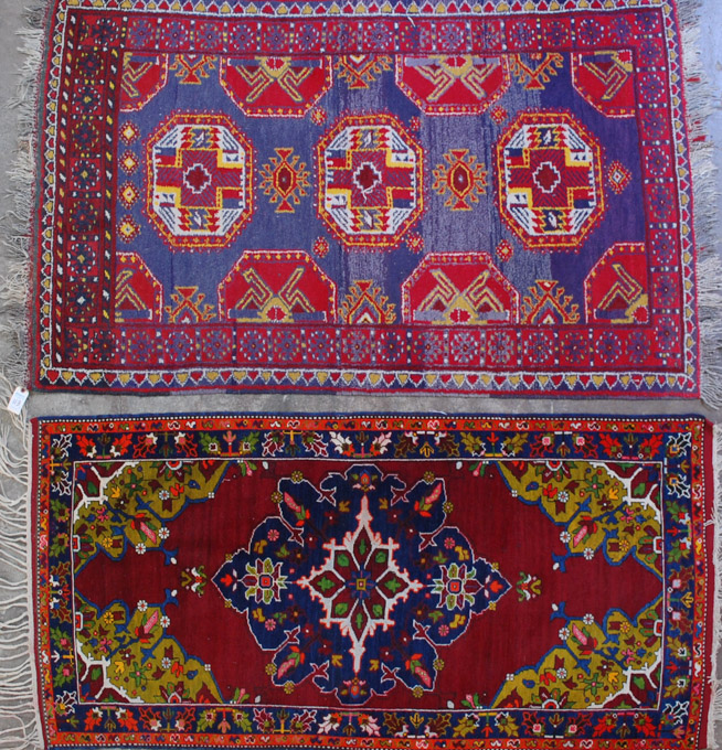 Appraisal: TWO AFGHAN TRIBAL AREA RUGS ' x ' and '