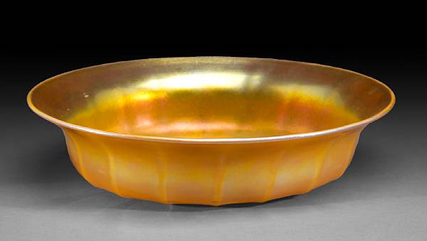 Appraisal: A Quezal iridescent glass bowl s Engraved Quezal diameter in