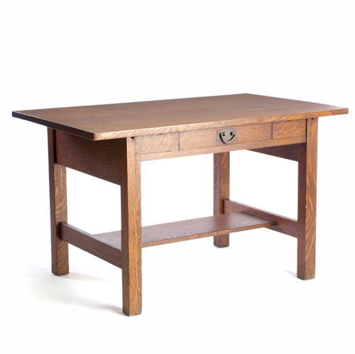 Appraisal: GUSTAV STICKLEY Single-drawer library table with an overhanging top iron