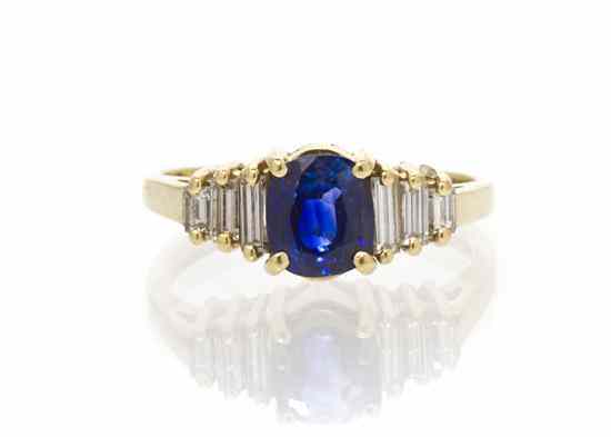 Appraisal: A Karat Yellow Gold Sapphire and Diamond Ring containing one