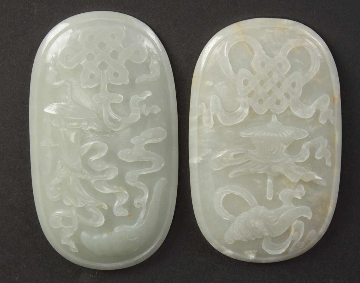 Appraisal: Chinese Carved White Jade Plaques th th cent Scrolled endless