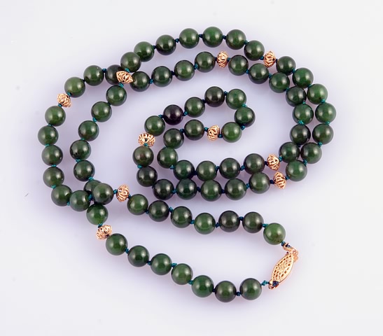 Appraisal: KY pearl clasp and separator beads long with mm jade