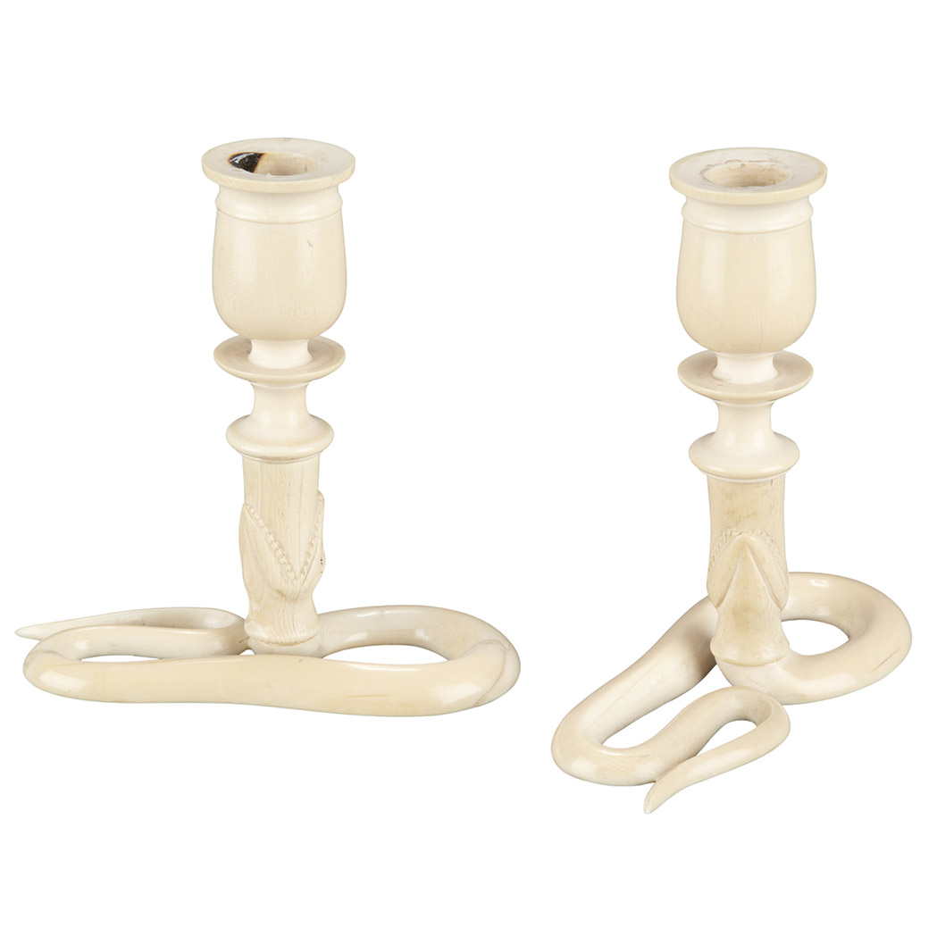 Appraisal: Pair of Indian Ivory Candlesticks Each carved with a serpent