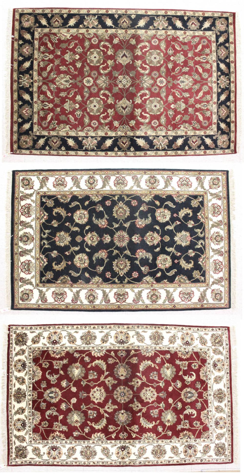 Appraisal: THREE SIMILAR HAND KNOTTED ORIENTAL AREA RUGS Indo-Persian Persian Isfahan