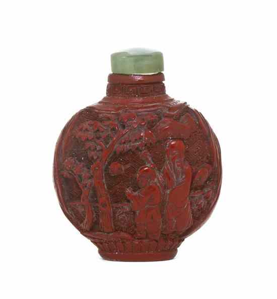 Appraisal: A Carved Cinnabar Lacquer Snuff Bottle of compressed globular form