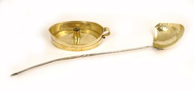 Appraisal: An th century brass straining ladle with a wrought iron