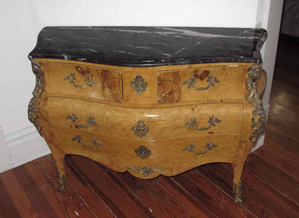 Appraisal: BOMBE MARBLE TOP COMMODE WITH ORMOLU MAIDENS Variegated black marble