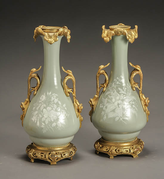 Appraisal: Pair of French Ormolu Mounted P te-sur-P te Celadon Glazed